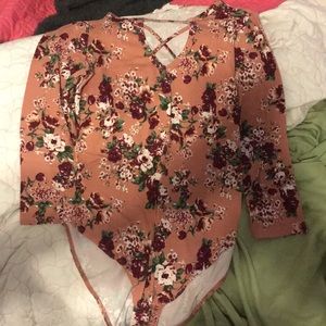 Body suit, crosses in the front